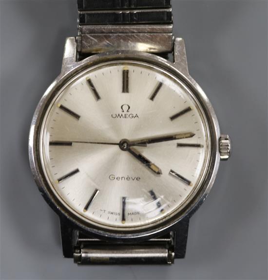 A gentlemans stainless steel Omega manual wind wrist watch.